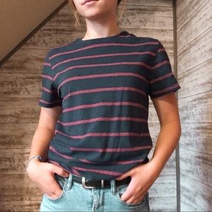 navy and orange/red striped tee